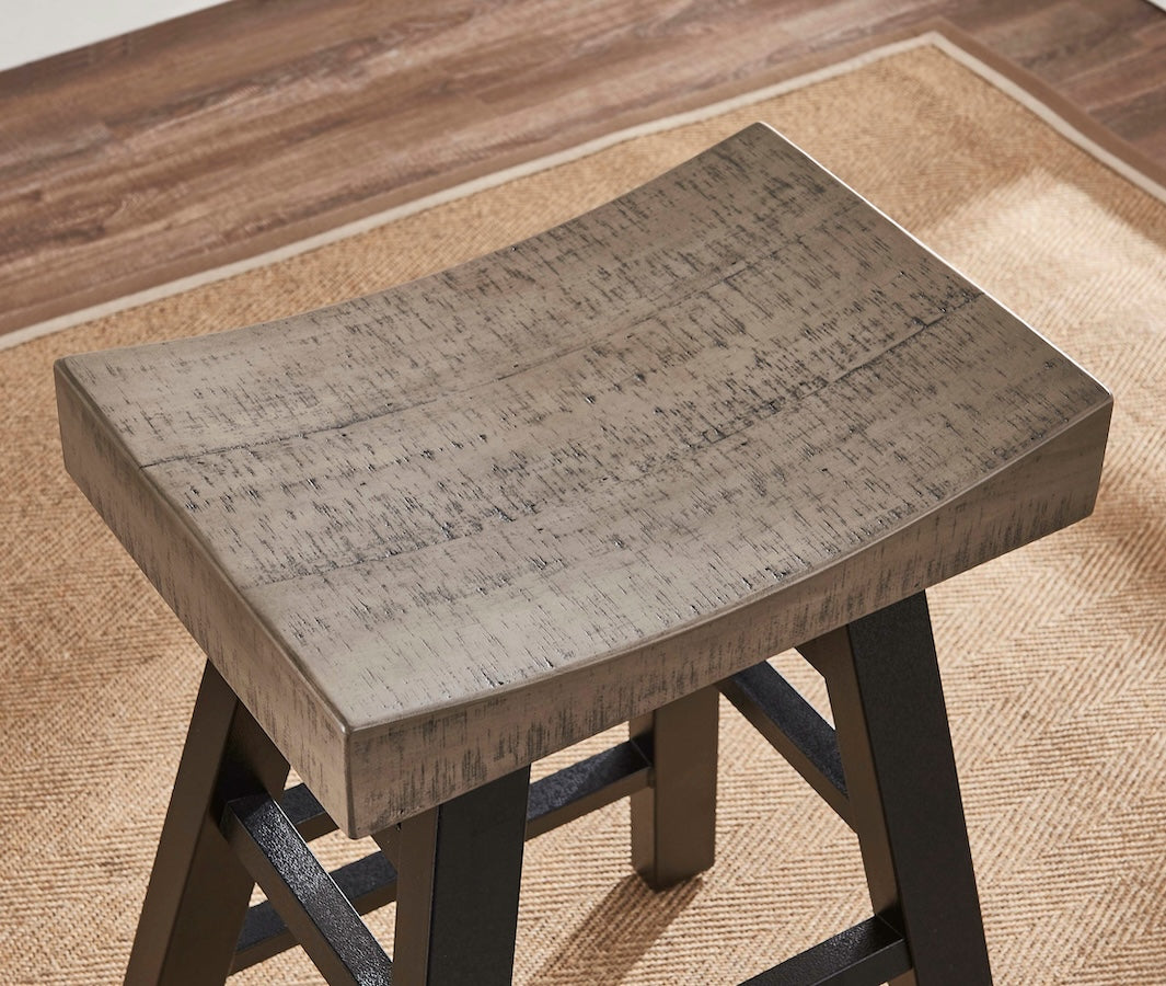 Closeup on the seat of the American Heritage Cheyenne counter height stool in an Ocean/Graphite finish.