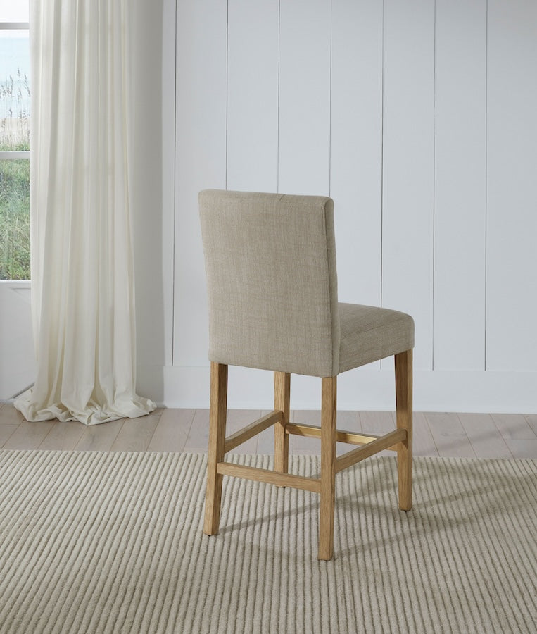 American Heritage Port Royal counter height stool in linen upholstry.