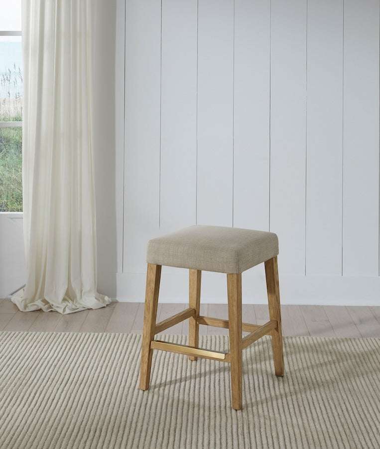 Port Royal Backless Stool with white oak finish, Sahara Sand linen cushioned seat, and sturdy wooden legs with cross supports
