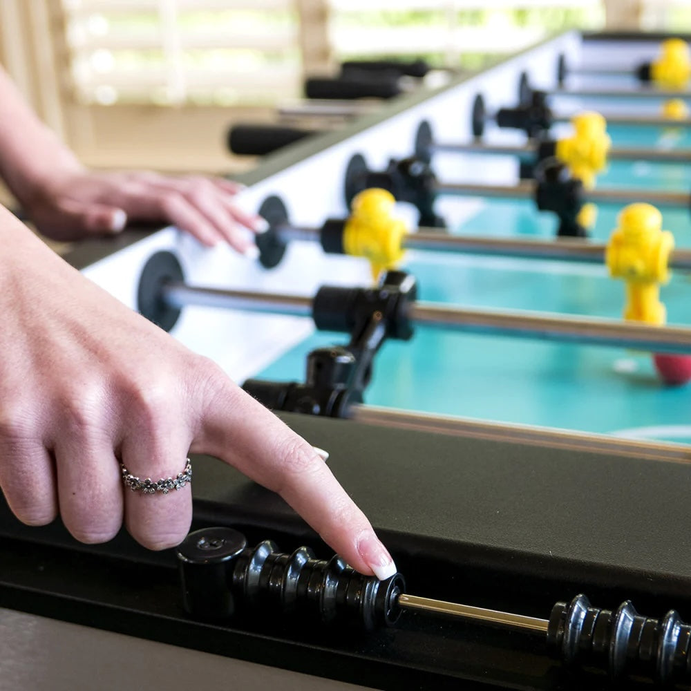 American Heritage Velocity foosball table in Silver - closeup of abacus scoring system and plastic foosball figures.