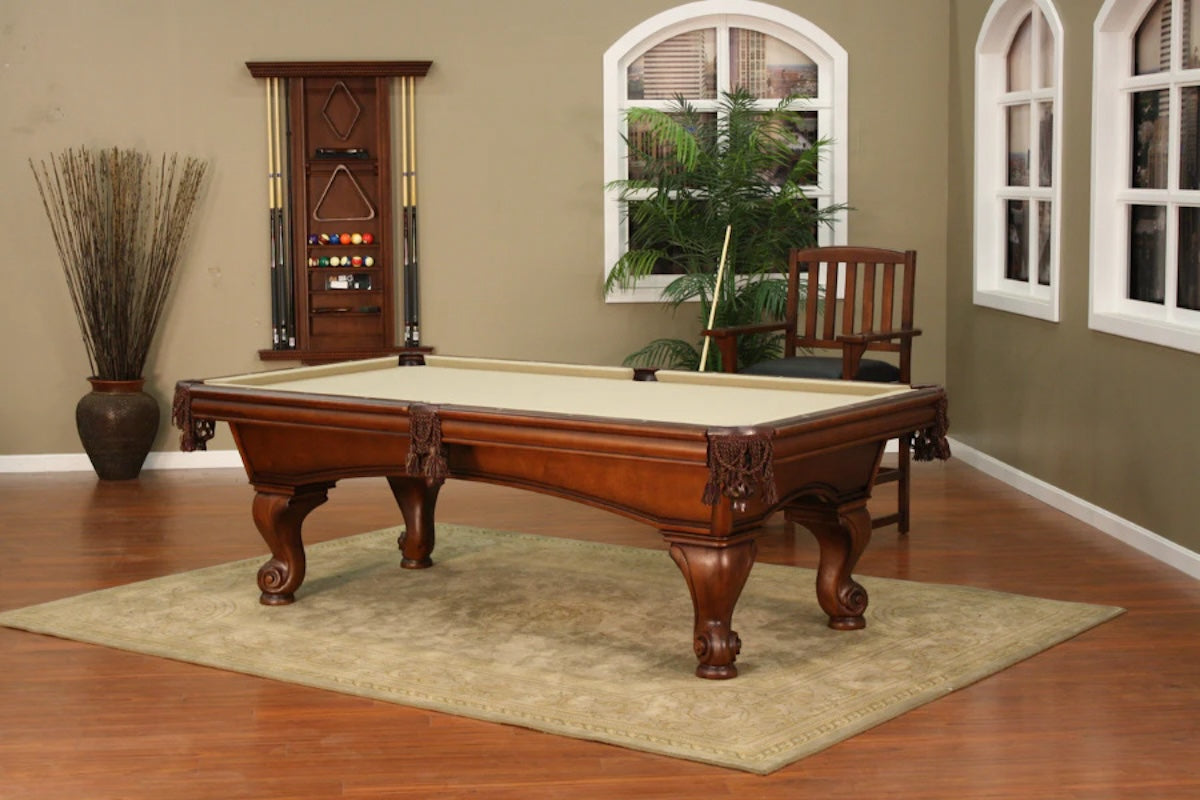 A game room with a Camden pool table by American Heritage with a Navajo finish and khaki felt.