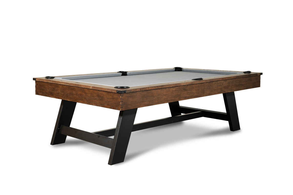Nixon Hunter slate pool table with brushed walnut wood frame, black metal legs, gray felt, and leather drop pockets.