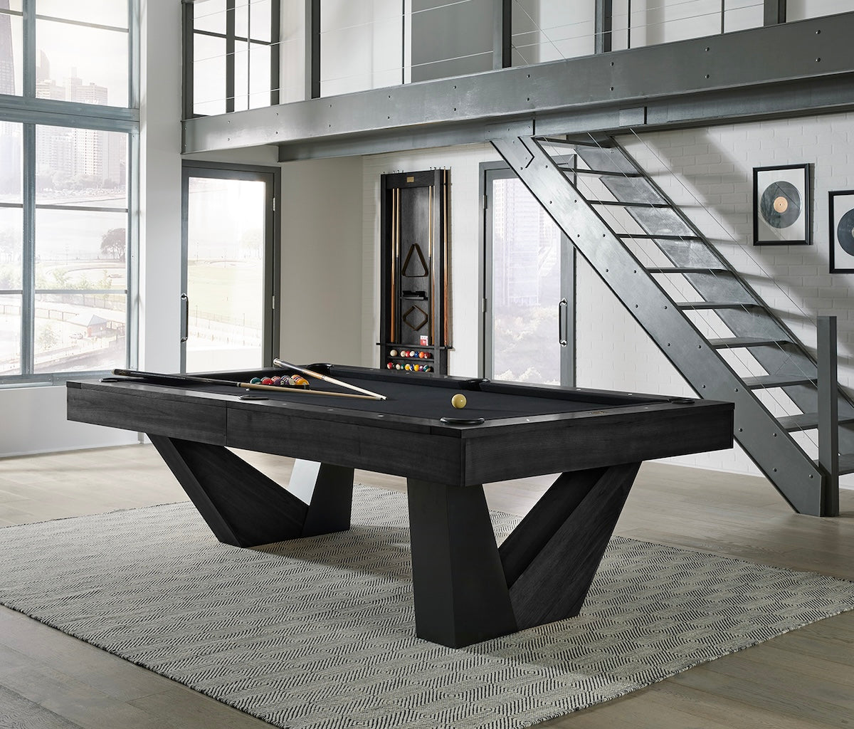 The American Heritage Annex slate pool table in Black Ash becomes the centerpiece of this game room.