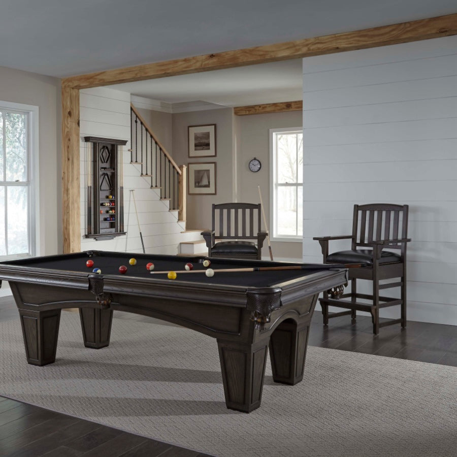 A Game room with an Austin billiard table designed by American Heritage in black flet and Riverbank finish.