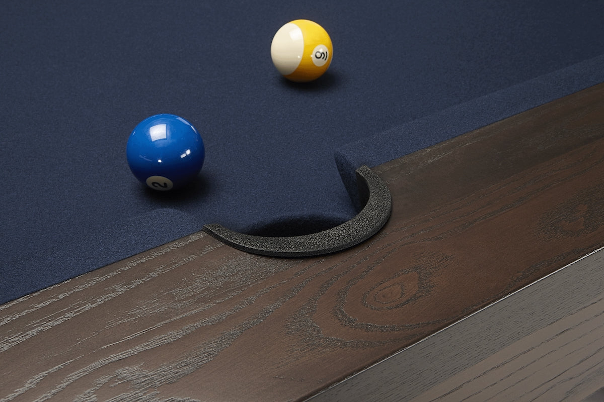Close-up on a pocket of the American Heritage Deerfield slate pool table.
