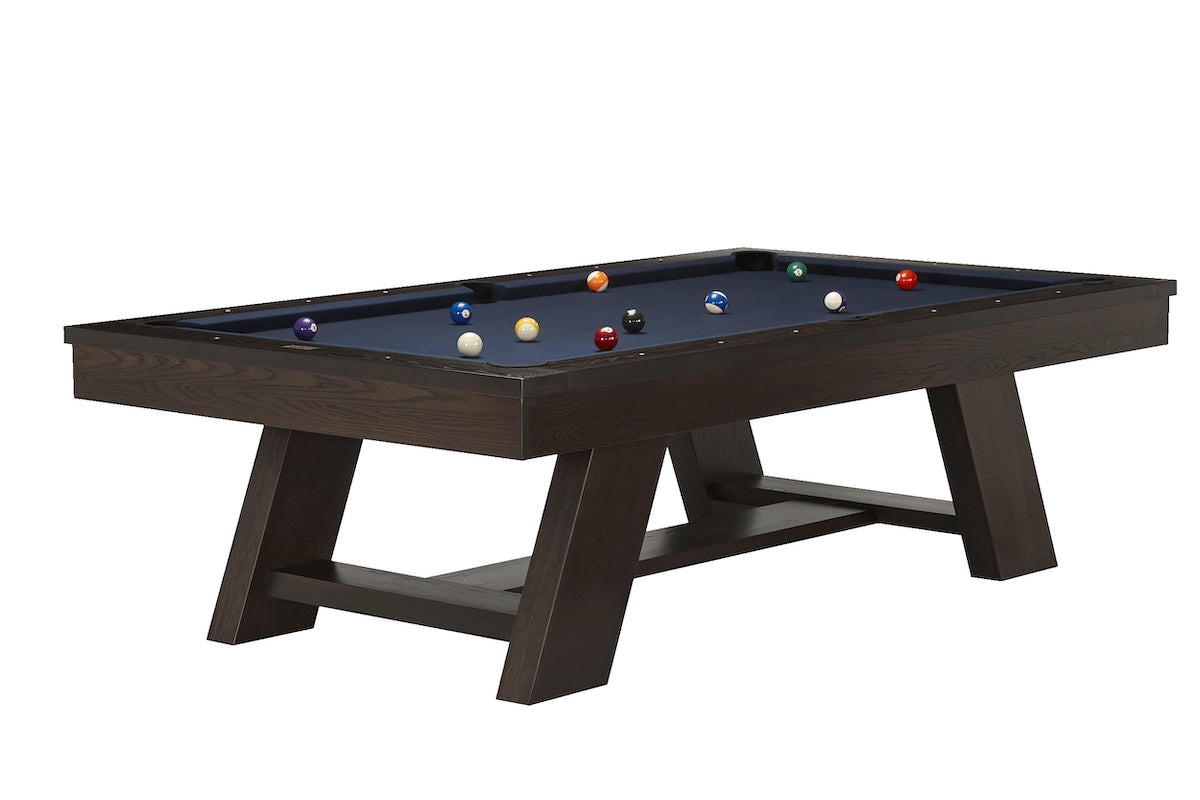 Angled view of the Deerfield billiard table in a Brushed Walnut finish and blue felt designed by American Heritage.