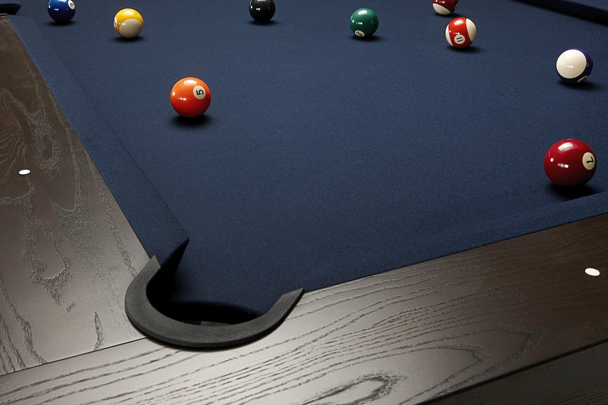 View of the Deerfeild American Heritage slate pool table from a corner drop pocket.