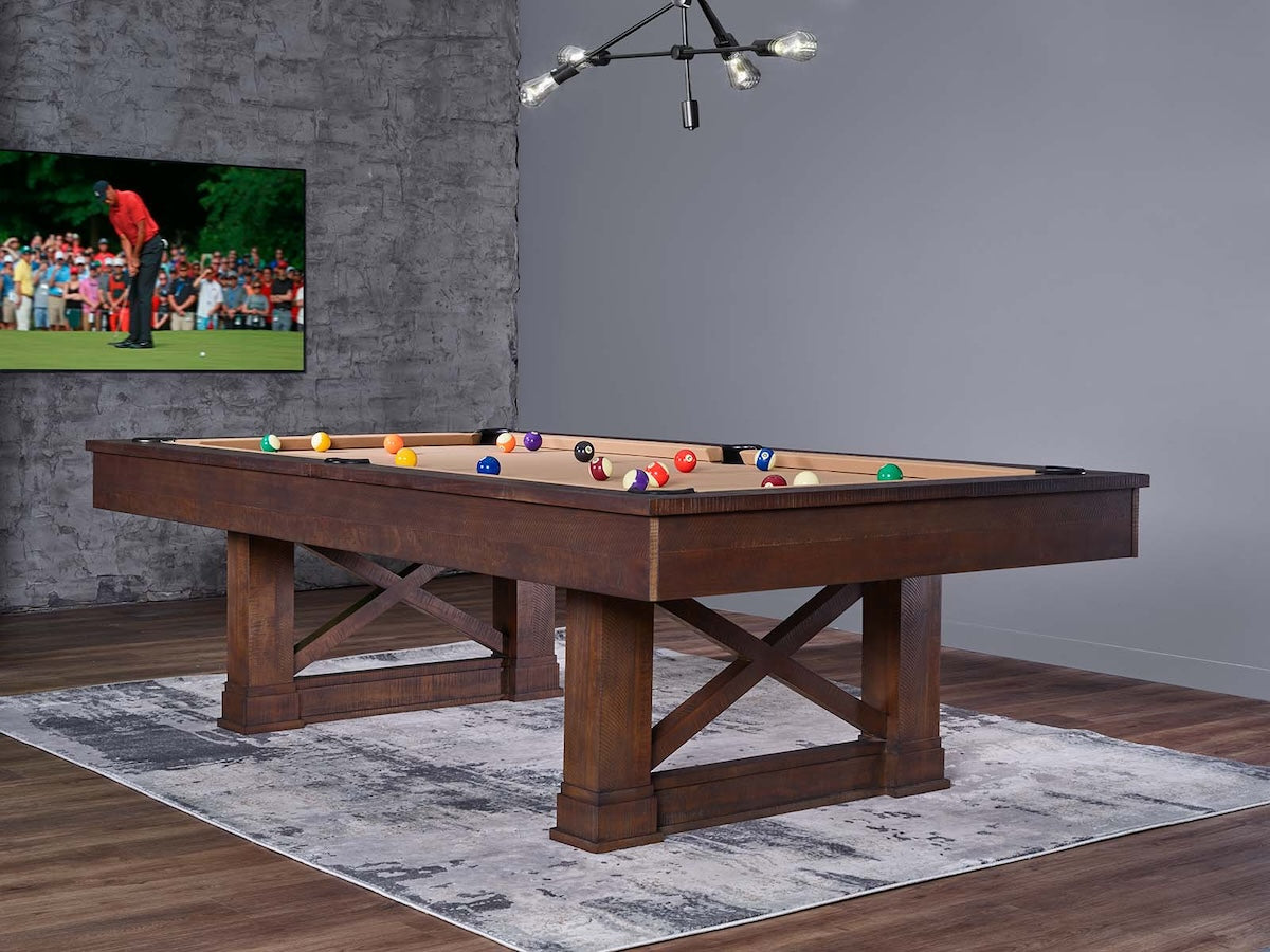 The Farmhouse slate pool table by American Heritage pictured in a game room with khaki felt and Cappuccino finish.