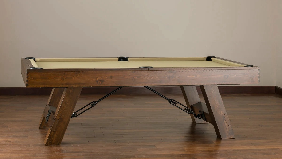 The Savannah pool table designed by American Heritage in a khaki top and a Sable finish.