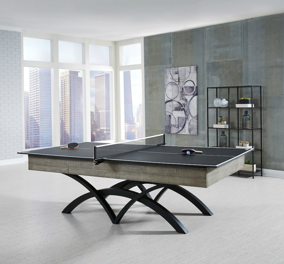 An American Heritage Victory billiard table in a Ocean finish with a table tennis top.