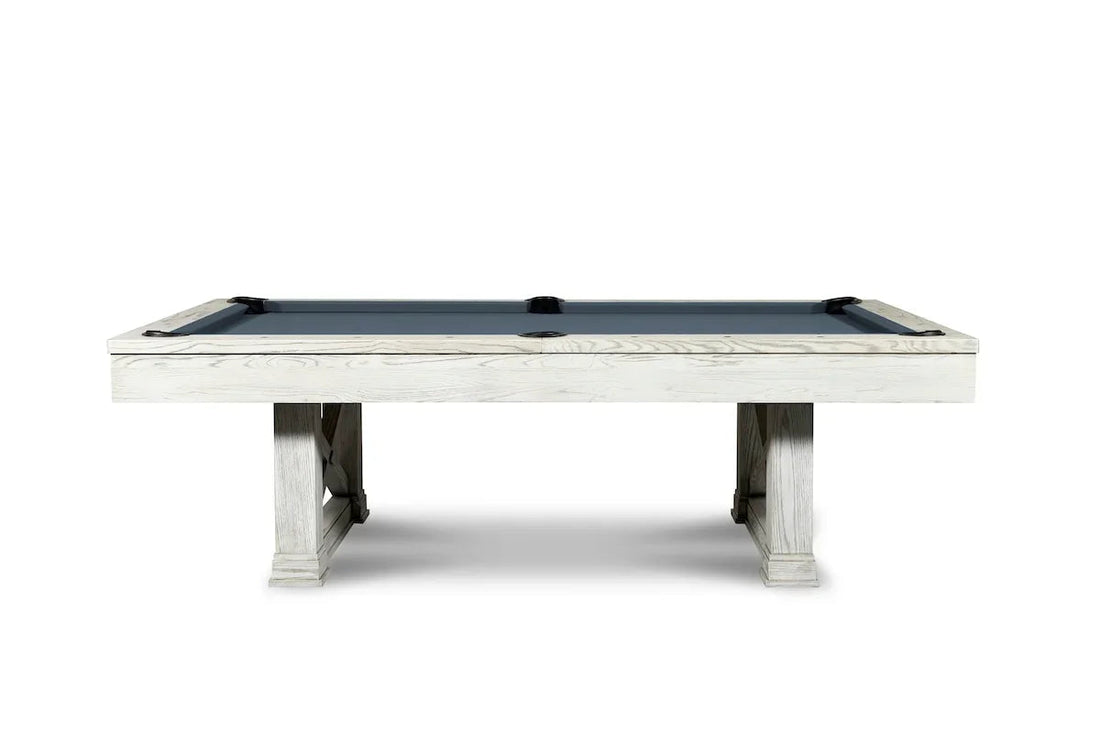 Isabella Agriturismo pool table in whitewash hardwood with X-pattern legs and black billiard cloth surface.