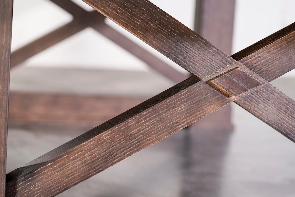 Wooden X design between the legs of an Agriturismo slate billiard table in Brownwash.