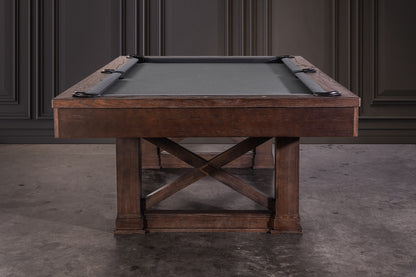 Agriturismo slate pool table in Brownwash stands in a game room.