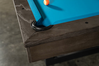 Leather-lined pool table drop pocket of Chino pool table.