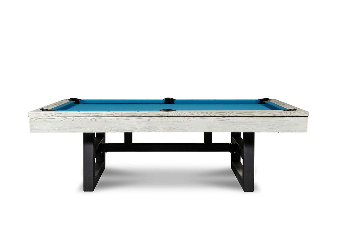Isabella Chino Slate Pool Table with whitewash solid wood frame, black metal legs, and bright blue billiard cloth surface.
