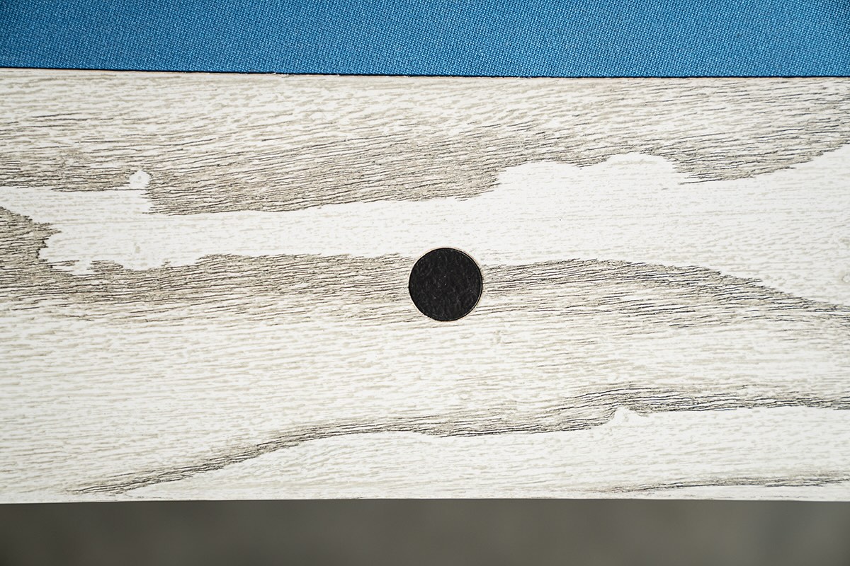 Round black sight on Chino slate pool table in whitewash.