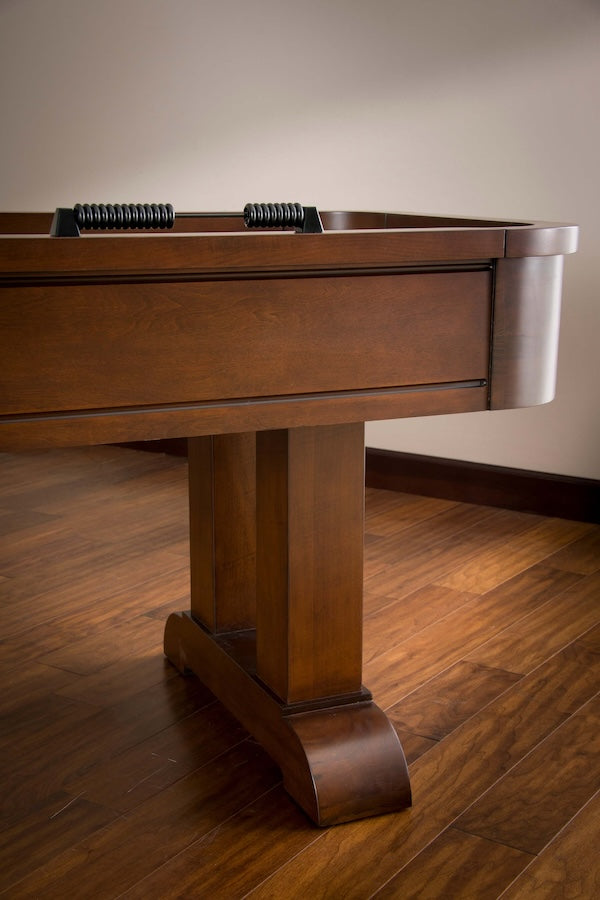 American Heritage Milan shuffleboard table finished in Navajo - closeup on legs.