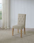Port Royal Dining Stool featuring beige linen upholstery with button tufting, and natural light wood legs with straight design.