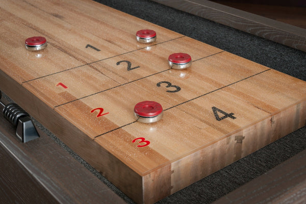 American Heritage Quest shuffleboard table finished in Glacier - closeup on end.