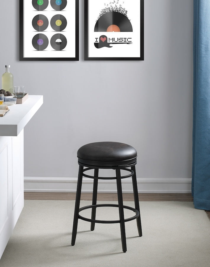 The American Heritage Silvano dual height stool in a Black metal finish in a game room.