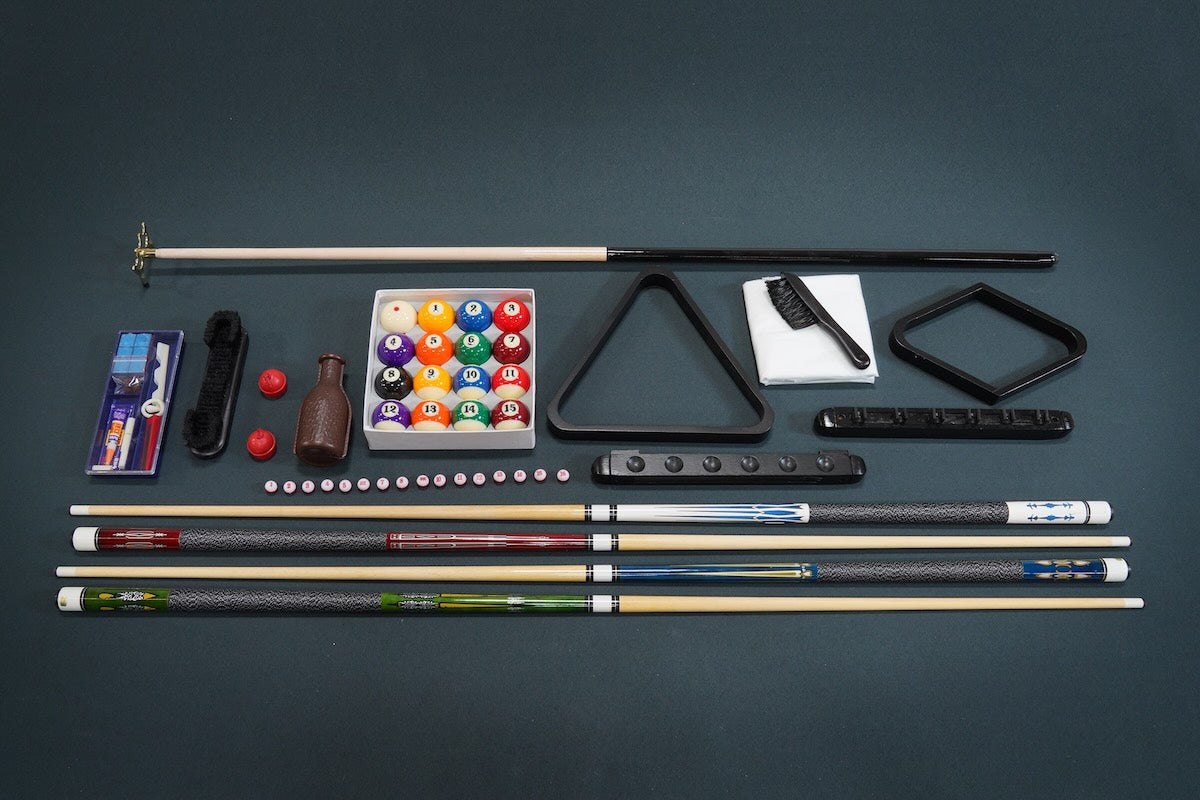 Premium billiard accessory kit spread out on a flat surface.