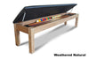 A pool table bench with open seat showing billiard balls and cues storage underneath.