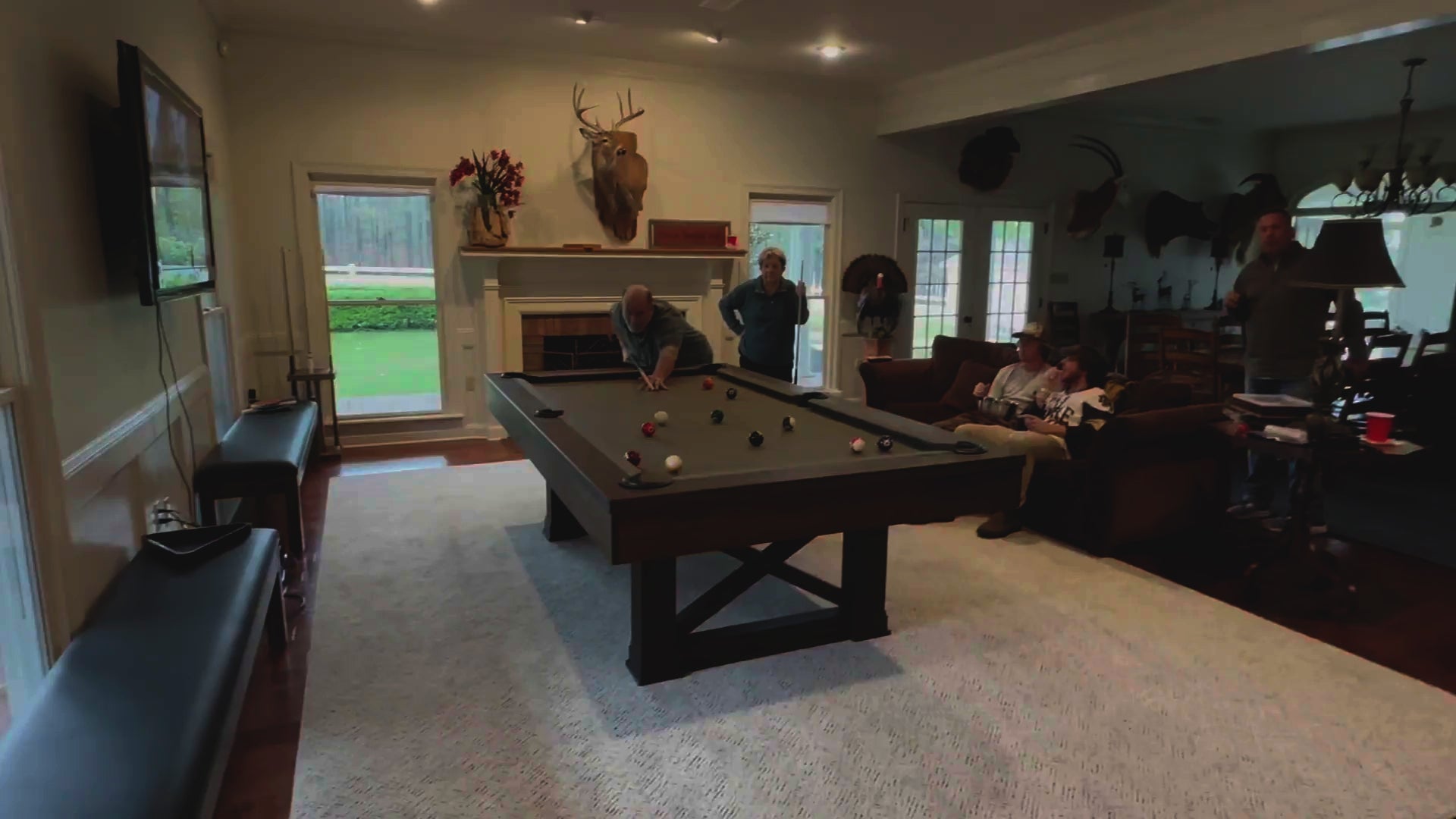 Woman reviews Agriturismo slate pool table in Brownwash purchased from the Family Game Room. 