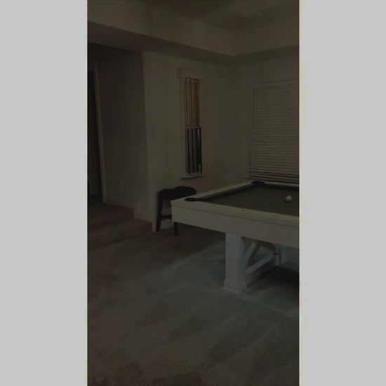 A Family Game Room customer reviews his Agriturismo slate pool table in Whitewash.