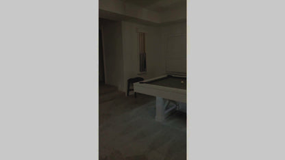 A Family Game Room customer reviews his Agriturismo slate pool table in Whitewash.