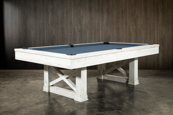 An angled picture of the Isabella Agriturismo slate pool table in whitewash with a studio background.