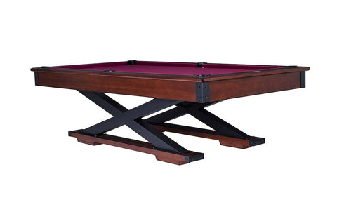 The Quest pool table in a Navajo finish designed by American Heritage with dark magenta-colored felt.