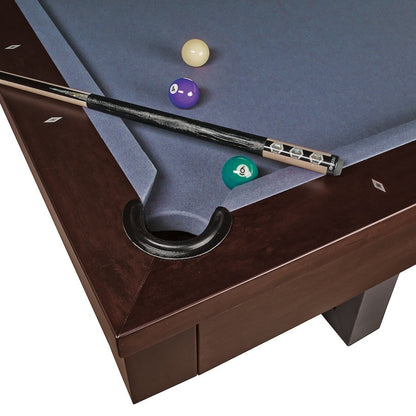 A closeup on a corner pocket of the Abbey Pool table with a blue gray felt color. Designed by American Heritage.