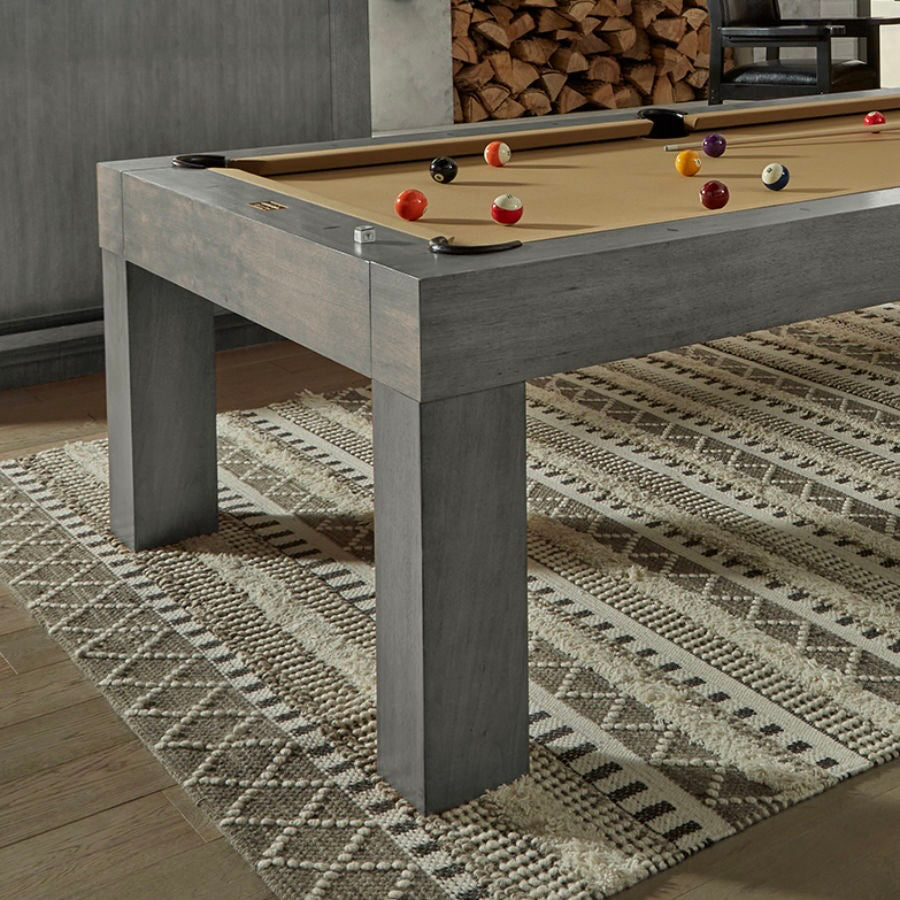 The American Heritage  Alta billiard table in a Charcoal finish is the centerpiece of this game room.