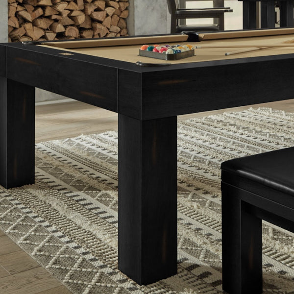 Close-up on the legs of the Alta billiard table designed by American Heritage with a Peppercorn finish.