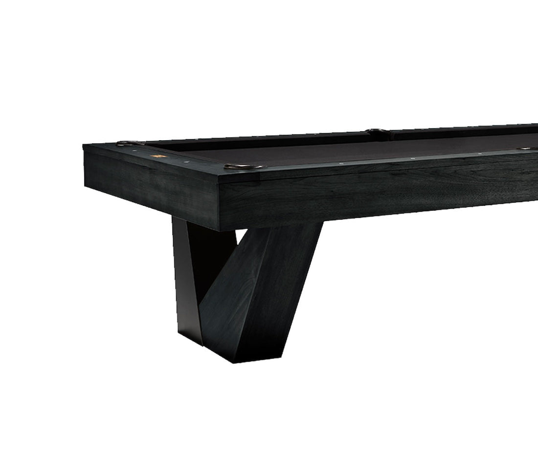 Close-up view of the legs of the American Heritage Annex slate pool table in a Black Ash finish and black felt.
