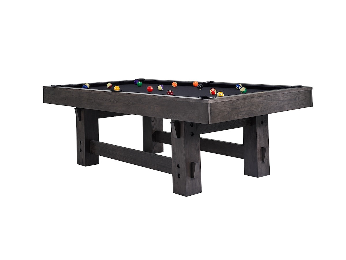 Angled view of a Bristol slate pool table designed by American Heritage with a Charcoal finish and black felt.