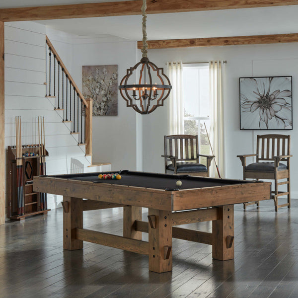 A game room with an American Heritage Bristol pool table in a Harvest finish along with spectator chairs designed by American Heritage.