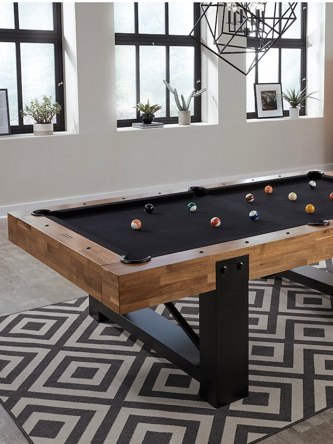 Elevated corner view of a Knoxville slate pool table designed by American Heritage with black felt.