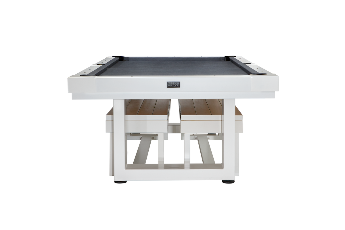 End view of the Lanai slate pool table in a Pearl White finish with two Lanai storage benches underneath designed by American Heritage.