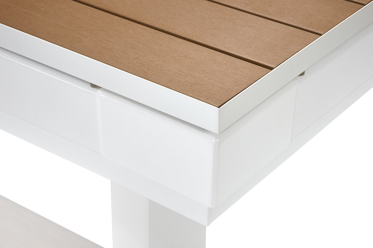 Close-up on a corner of an Lanai slate pool table designed by American Heritage in a Pearl White finish with a dining top. 