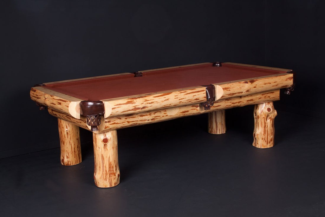 Viking Industries log pool table with rustic natural wood frame, round legs, brown cloth, and leather pockets in log cabin style.